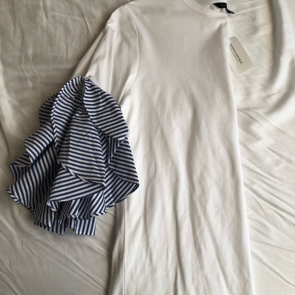 Top with ruffle sleeves